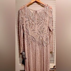 Beautiful Beaded Gown. Never worn Size 14